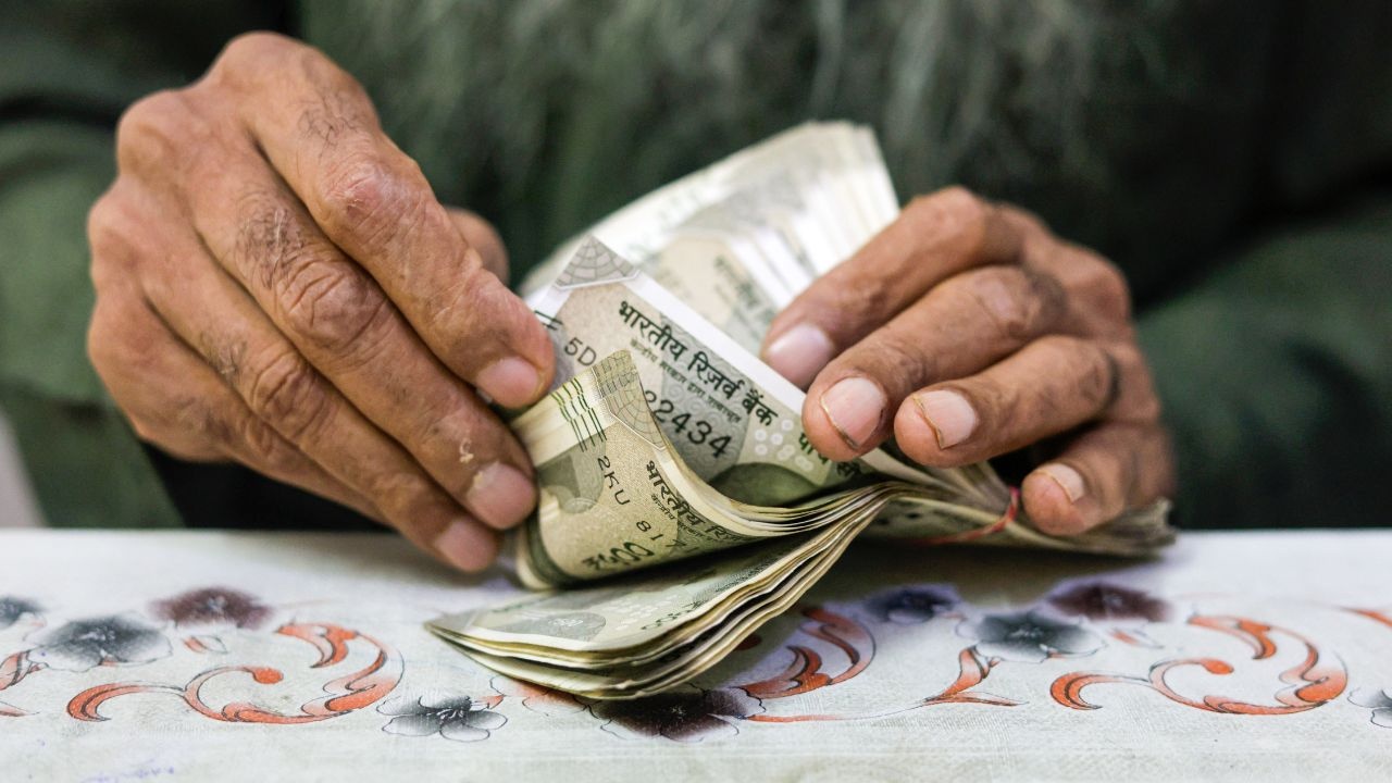 Indian Rupee Maintains Stability Amid Dollar Demand